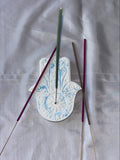 Incense holder Mandala hand blue splash
